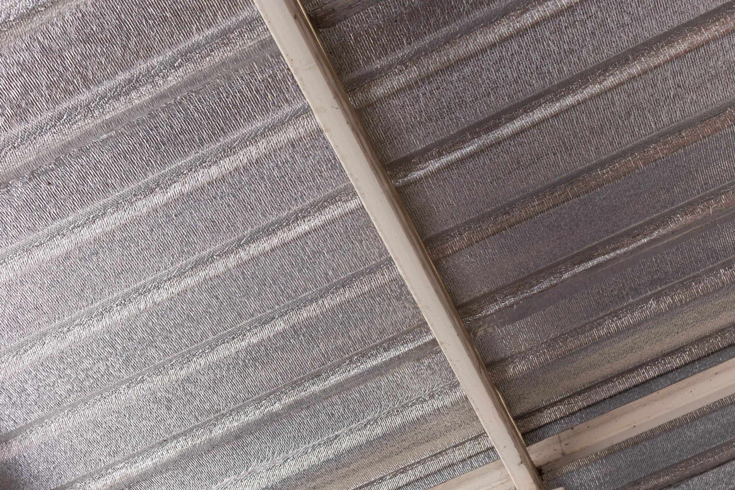 Metallic reflective surface of insulation